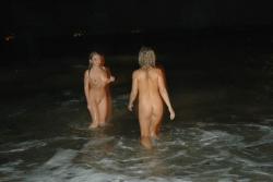 Lesbian fun at night beach 1/54