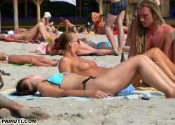 Petite candid cuties on the nude beach 24/24