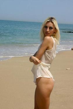 Cute blonde on nude beach  45/61