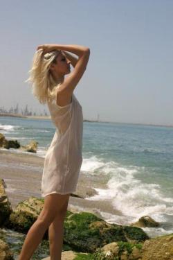 Cute blonde on nude beach  49/61
