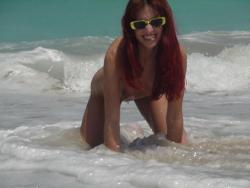 Redhead on a nude beach  19/80
