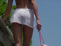 Redhead on a nude beach  14/80
