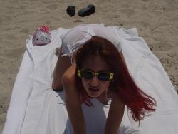 Redhead on a nude beach  31/80