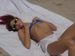 Redhead on a nude beach  33/80