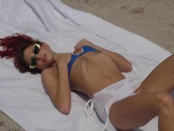 Redhead on a nude beach  33/80