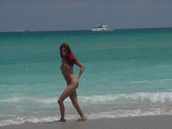 Redhead on a nude beach  37/80