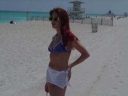 Redhead on a nude beach  45/80