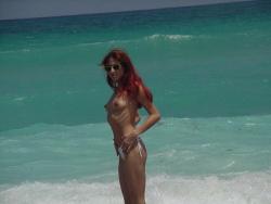 Redhead on a nude beach  61/80