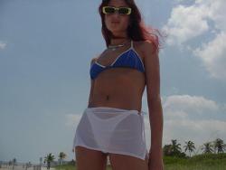 Redhead on a nude beach  64/80