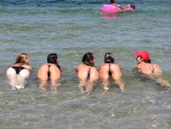 Amateurs girl topless group shot on the beach  4/47