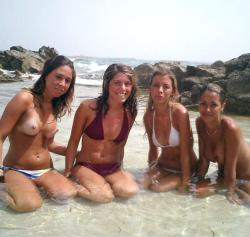 Amateurs girl topless group shot on the beach  27/47
