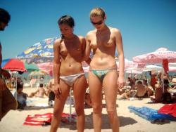 Two amateurs girl topless shot on the beach  6/48