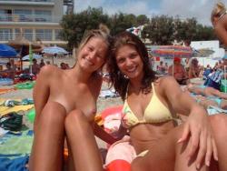 Two amateurs girl topless shot on the beach  15/48