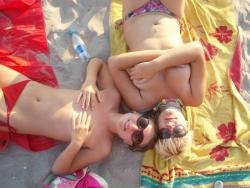Two amateurs girl topless shot on the beach  19/48