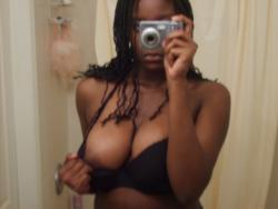 Black amateur girl and her big  tits on selfpics 4/15