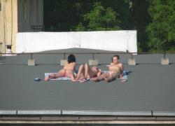 Teens sunbathing in the roof ( voyeur ) 3/13