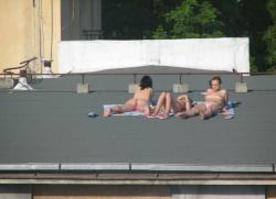 Teens sunbathing in the roof ( voyeur ) 4/13