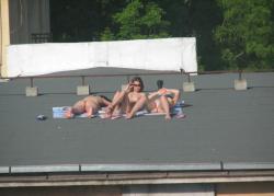 Teens sunbathing in the roof ( voyeur ) 8/13