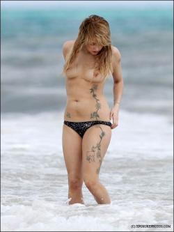 Celeb - peaches geldof topless on beach  5/21