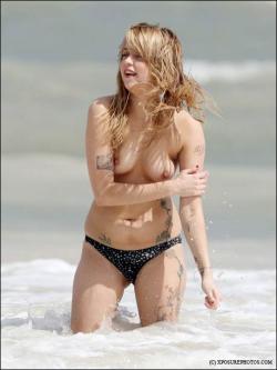 Celeb - peaches geldof topless on beach  3/21