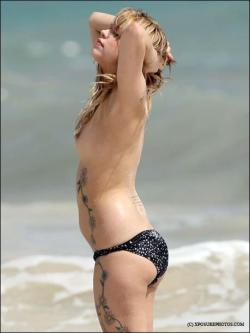 Celeb - peaches geldof topless on beach  12/21