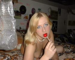 Fantastic young blonde poses and licks on her loll 6/11
