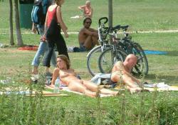 Young nudists and theirs hot summer at the water 49/50