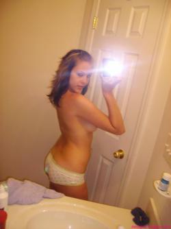 Selfshot pics - cute teen showing tits in bathroom 1/28