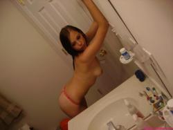 Selfshot pics - cute teen showing tits in bathroom 28/28
