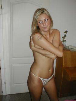 Blonde girl in underwear at home 24/26