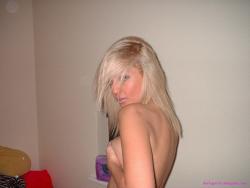 Young blonde girl teen in her room at home 2/14
