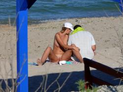Nudist couple on the beach  2/15