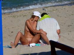 Nudist couple on the beach  5/15