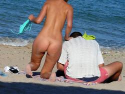 Nudist couple on the beach  6/15