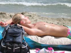 Voyeur on the beach 100/254