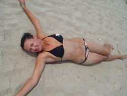 Voyeur on the beach 184/254