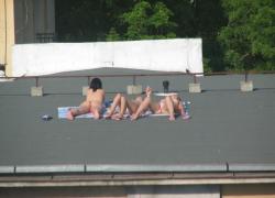 Spycam - nude girls on the roof 24/26