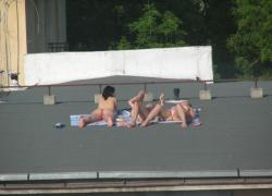 Spycam - nude girls on the roof 25/26