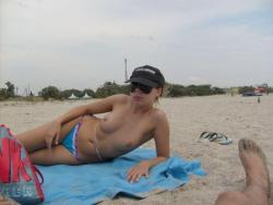 Teen on nudist beach holiday amateur set  12/29