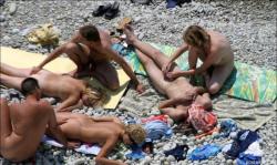 Orgy at a public nude beach 6/10