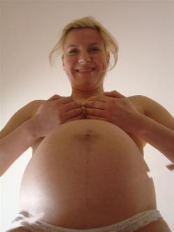 Blonde pregnant wife shows herself naked at home  5/7