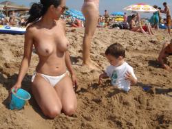 Brunette amateur with big boobs at beach  20/34