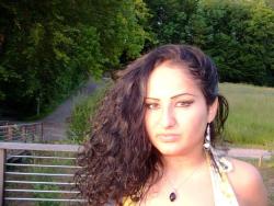 Latina posing outdoors 54/66