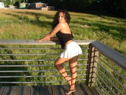 Latina posing outdoors 57/66