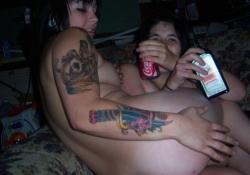 Tattooed girls get naked at a party  31/37