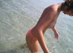 Pretty girl topless at beach  18/33