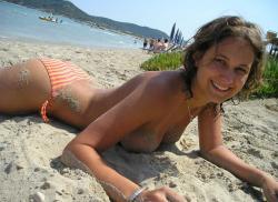 Pretty girl topless at beach  26/33