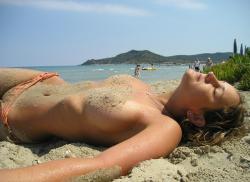 Pretty girl topless at beach  33/33