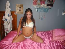 Teen in lingerie posing in the underwear on bed  10/16