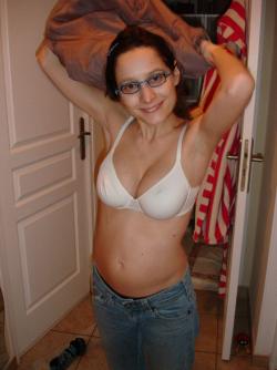 Pregnant milf with glassesposing  12/84